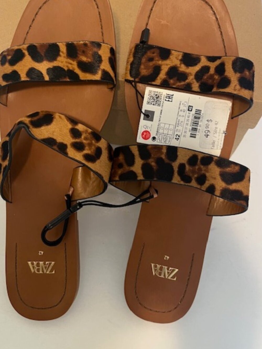 Zara leopard print leather flat sandal.